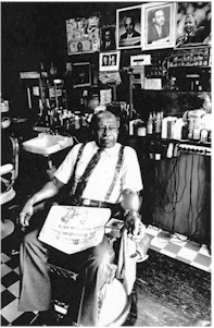 James Armstrong in his barber shop